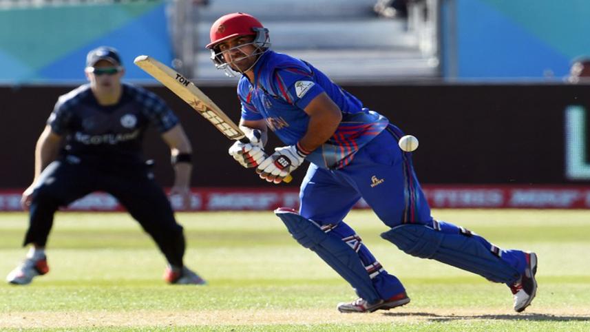 Afghanistan batsman Samiullah Shenwari steers a ball 