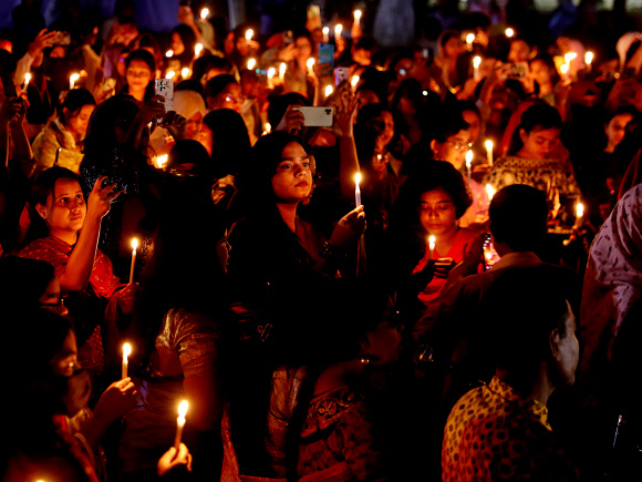 4. women holding candles in int'l women day.JPG