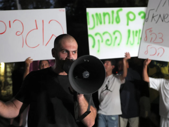 Far-right Israelis protest outside ‘NAZA’ director’s home after Venice win