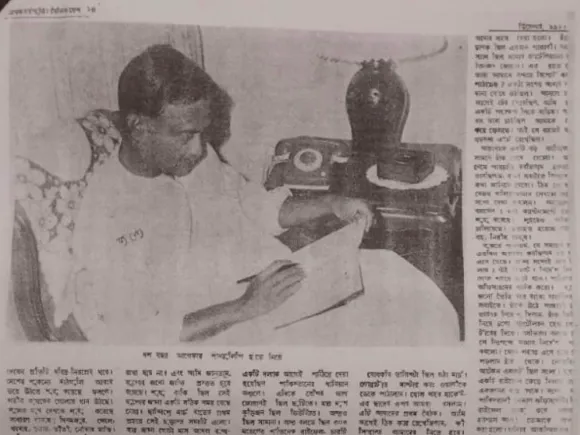 Ziaur Rahman writing his diary.jpg