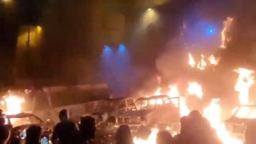 Protesters gather as vehicles burn, amid evolving anti-government unrest, in Tehran, Iran, in this screen grab obtained from a social media video released on January 9, 2026. Photo: Social Media/via Reuters Purchase Licensing Rights