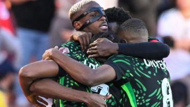 Nigeria's forward #09 Victor Osimhen celebrates his goal with teammates during the Africa Cup of Nations (CAN) quarter-final football match between Algeria and Nigeria at the Grand stadium in Marrakesh on January 10, 2026. Photo: AFP