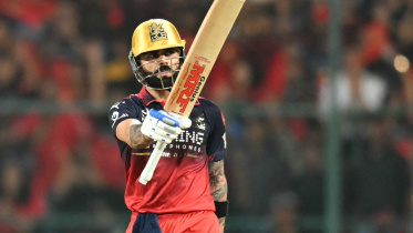 AFP__20260424__A8WE3UR__v1__MidRes__CricketIndIplT20BengaluruGujarat.jpg