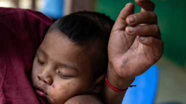 Child rests in sindukpara. Photo by Orchid Chakma 