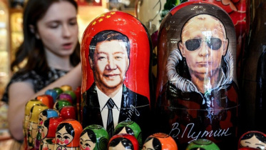 Russian President Vladimir Putin visits China's Xi Jinping days after Donald Trump's trip to Beijing. Photo: AFP