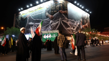 A billboard with a graphic design about the Strait of Hormuz on a building in Tehran, Iran, May 6, 2026. Photo: Reuters