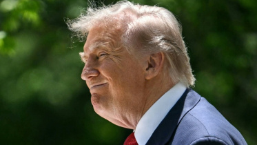Trump shared dozens of posts boosting unfounded conspiracy theories. Photo: AFP