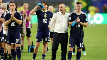 2026-06-25T002130Z_1372532475_UP1EM6P00ZS7Q_RTRMADP_3_SOCCER-WORLDCUP-SCO-BRA.JPG