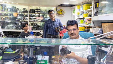 Anupom Singha Khokon repairs cameras others cannot fix