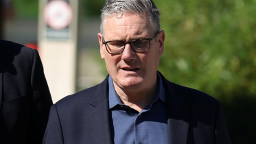 Britain's Prime Minister Keir Starmer walks as he visits a housing development in north London, Britain, June 19, 2026. Photo: Reuters