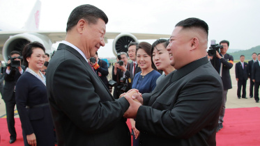 Xi Jin Ping meets Kim Jong Un.JPG