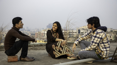 Three people talking 