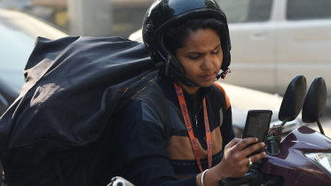 women gig worker AFP.png