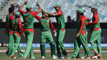 Bangladesh teammates celebrate