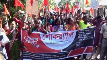 Santals stage demo demanding justice over attack on them in 2016.