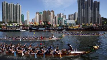 Participants compete in a dragon boat race in Hong Kong, June 20, 2015.
