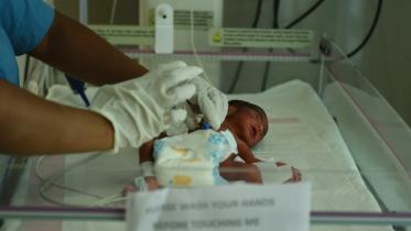 malnourished newborn Indian baby, 