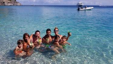 Lionel Messi and Luis Suarez with families