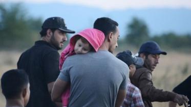 migrants new.jpg