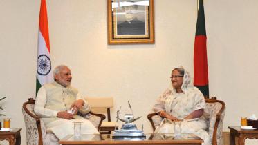 Indian Prime Minister Narendra Modi and Bangladesh PM Sheikh Hasina in a tete-a-tete at the latter's office.