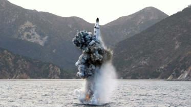 North Korea,test-fires,submarine,launched,missile,500 kilometres,Japan,weapons,analysts,nuclear,strike,ambitions