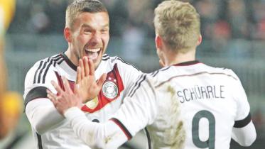Podolski saves.jpg