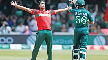 Bangladesh pace bowler Mohammad Saifuddin celebrates after dismissing Pakistan batsman Babar Azam