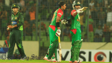 Tamim Iqbal salutes the crowd after scoring half-century against Pakistan on the third ODI at Sher-e Bangla National Stadium on Wednesday. Photo: Firoz Ahmed