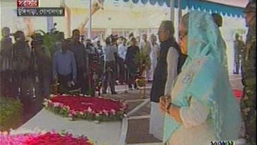 President M Abdul Hamid and Prime Minister Sheikh Hasina pay homage to Father of the Nation Bangabandhu Sheikh Mujibur Rahman, placing wreaths at his Mazar in Tungipara upazila of Gopalganj on his 95th birth anniversary Tuesday. Photo: TV grab