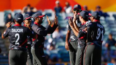 United Arab Emirates' team mates celebrate