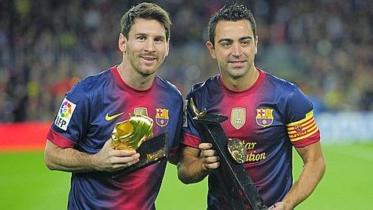 Lionel Messi and Xavi Hernandez.