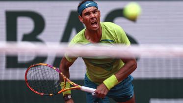 Spain's Rafael Nadal eyes the ball as he returns to Australia's Jordan Thompson during their men's singles match at the Court Philippe-Chatrier on day two of the Roland-Garros Open tennis tournament in Paris