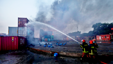 Firefighters trying to put out fire at the BM Container depot in Sitakunda