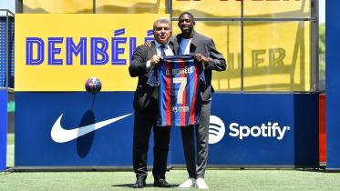 FC Barcelona's French forward Ousmane Dembele and FC Barcelona's President Joan Laporta pose during Ousmane Dembele's ceremony at the Joan Gamper training ground in Sant Joan Despi, near Barcelona