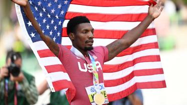 Gold medallist USA's Fred Kerley celebrates after crossing the finish line in first place in the men's 100m final during the World Athletics Championships at Hayward Field in Eugene