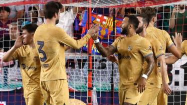 Barcelona's Dutch forward Memphis Depay (R) celebrates with teammates after scoring a goal during the international friendly football match between the New York Red Bulls and FC Barcelona at Red Bull Arena in Harrison, New Jersey