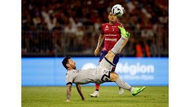 Paris St Germain's Lionel Messi scores their fifth goal.