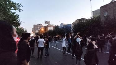 People attend a protest over the death of Mahsa Amini, a woman who died after being arrested by the Islamic republic's "morality police", in Tehran, Iran September 21, 2022. 