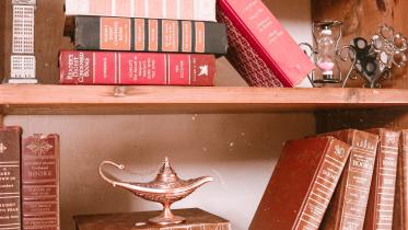Assortment of random things on a shelf. 