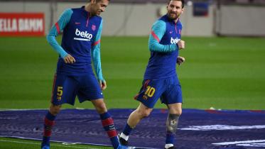 lionel_messi_and_sergio_busquets.jpg