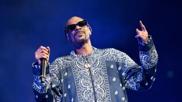 Snoop Dogg postpones 30th anniversary concert in support of Hollywood strikes
