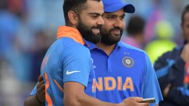 kohli-sharma.jpg