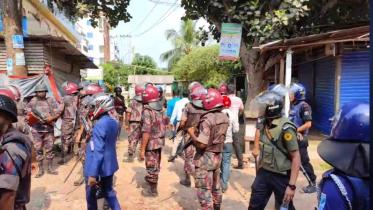2 policemen injured as RMG workers and cops clash in Gazipur