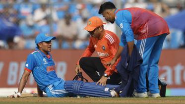 Gill retires hurt after scoring 79