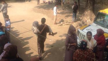 Elderly carried to vote in national election 2024