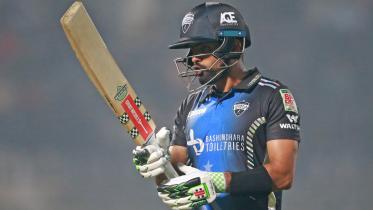 Rangpur Riders batter Babar Azam walks back to the pavilion after being dismissed against Durdanto Dhaka in Sylhet on Saturday.