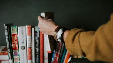 Conquering that stack: 5 ways to finish a book in a week       christin-hume-k2kcwkandwg-unsplash
