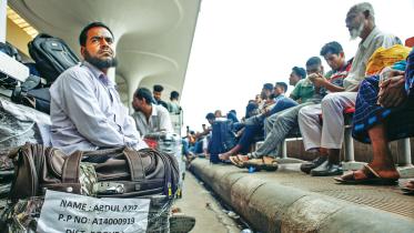 Malaysia-bound workers crowd Hazrat Shahjalal airport