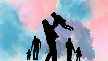 Silhouette of dad and child