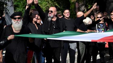 Neo-fascists do the Nazi salute as they gather in the town where dictator Benito Mussolini was born to commemorate the hundredth anniversary of the March on Rome, in Predappio, Italy, October 30, 2022. REUTERS/Flavio Lo Scalzo/File Photo Purchase Licensin